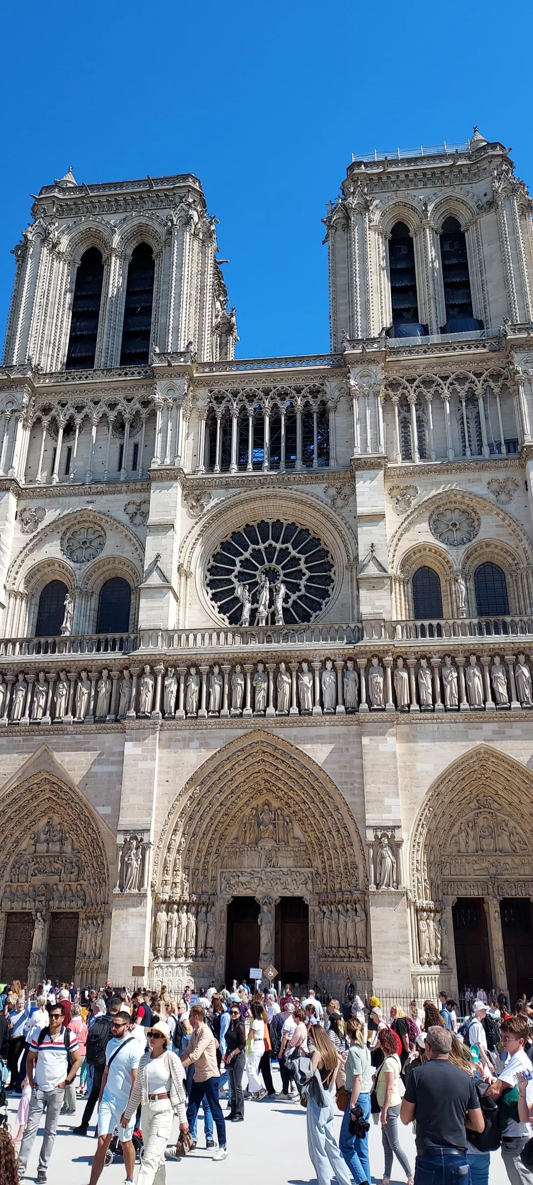Entrance of Notre-Dame de Paris Cathedral in France. This square is called "le Parvis"